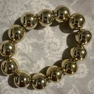 Garold Miller Metallic Golden Stretch Bracelet. Never worn. New.